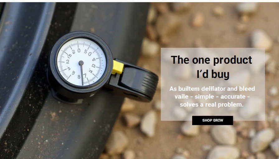 Compact tire pressure gauge with built‑in deflator on valve stem reading 18 PSI – $25 – simple and accurate